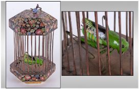 Chinese Painted Metal Cricket Cage, decorated with polychrome flowers on a black ground to top and