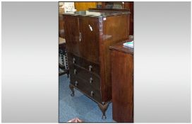 1930s Mahogany Tallboy/Chest, with cupboards above three draws, standing on cabriole legs. 30 inches