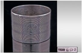 A Silver Engine Turned Napkin Holder. Hallmark Birmingham 1923. 46.2 grams.