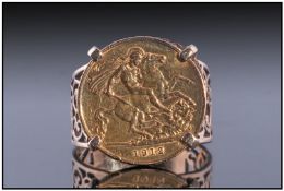 9ct Gold Half Sovereign Ring. Set with a 1912 half sovereign, pierced shank. Fully hallmarked.