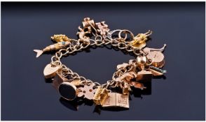9ct Gold Charm Bracelet, Containing 20 Mixed Charms, Mostly 9ct, Complete With Padlock Fastener