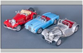 Burago Die Cast Model Cars, 3 in total. 1. Lancia Aurlia B24 Spider 1955 1/18. 2. Mercedes Benz 500k