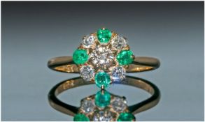 18ct Gold Set Vintage Diamond & Emerald Cluster Ring with flowerhead setting. Hallmarked 18ct. The