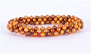 Gold/Copper Freshwater Pearl Bracelet, a good quantity of small cultured pearls woven onto