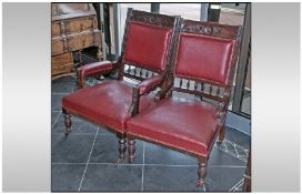 A Pair of Edwardian Mahogany Carved Frame Chairs, one a nursing chair and one an armchair, covered
