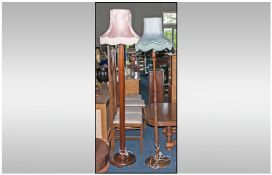 A Mahogany Column 1930's Standard Lamp With Shade. Together with a turned column standard lamp and
