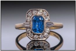 18ct Gold Sapphire And Diamond Ring, Central Sapphire Surrounded By Round And Baguette Cut