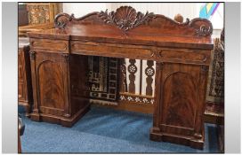 Early Victorian Mahogany Pedestal Sideboard, with carved Acanthus Leaf Top, supported by 2