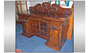 A William VI Pedestal Sideboard. With a later adapted centre, now unused as a glazed display unit.