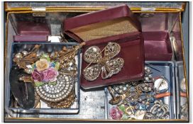 Collection of Costume Jewellery comprising mainly brooches, contained in a Coronation Souvenir Tin.