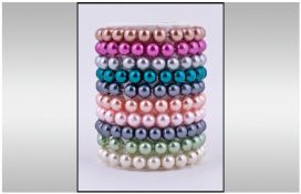 Collection Of 10 Multi Coloured Bead Fashion Bracelet.
