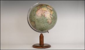 A Great Old Phillips World Globe set on a wooden circular plinth stand with working compass & chrome