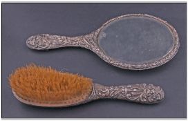 Heavily Embossed Silver Backed Hand Mirror, Hallmarked for Birmingham 1906. Together with matching