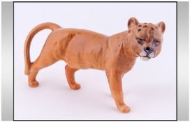 Beswick Lion Cub, model 1508, facing right. Designer Colin Melbourne, 4.75 inches. Issued 1957-1967.