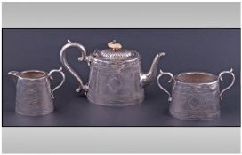 Shipping Interest. Three piece Bachelors tea service, all with matching later engraved decoration.