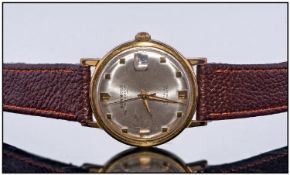 Gents Benmore Automatic Wristwatch, With Silvered Dial, Date Aperture And Baton Numerals, Gilt/