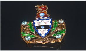 9ct Gold Enamelled Town Badge. The front with coat of arms set with four blue stones, marked "By