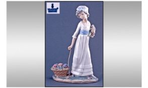 Lladro Figure "Wild Flower" Model number 5030. Issued 1974-1994. Height 11 inches. Mint condition.