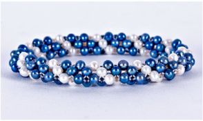 Peacock and White Freshwater Pearl Bracelet, two rows of small peacock pearls alternating with one