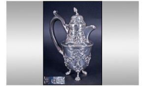 Victorian Silver Water Jug Of Good Quality, With embossed decoration of swags and garlands to body