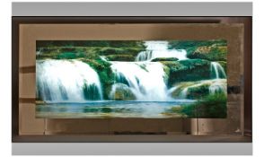 Mirrored Glass Illuminating Picture. Central image depicting a waterfall, bevelled glass. 19.5 x