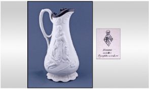 An Early Victorian Pewter Topped Parian Jug, with raised figures of "Naomi and her daughters-in-