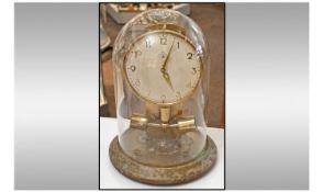 A German Junghans Electric Mantel Clock, under glass dome. A/F condition. Height 12 inches.