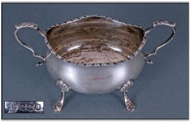 A Good Quality Silver Two Handled Sugar Bowl raised on shell & spade feet, Hallmark Sheffield