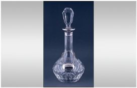 A Good Quality Silver Collared Cut Glass Decanter. Hallmark London 1993, with Silver Plated Spirit