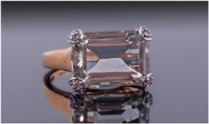 Green Amethyst and Diamond Ring, the octagon cut green amethyst, of approximately 7cts, set in 9ct