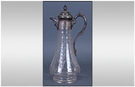Victorian Silver Plated and Etched Glass Claret Jug with mask spout. C 1860's. 12 inches high.