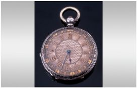 A Swiss Fine Silver Chased And Ornate Open Faced Ladies fob Watch. With finely decorated dial. Circa