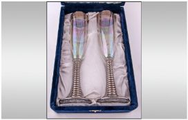 Pair of Silvered and Lustred Champagne Flutes, boxed in a satin lined, deep blue velvet, original