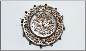 Late 19th/Early 20th Century Pressed Silver Brooch, Of Circular Form, With Rose Gold And Green