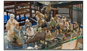 Collection Of Assorted Oriental Ceramic Figures. 16 in total. All Japanese figure dressed in