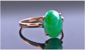 18ct Yellow Gold Set Single Stone Jade Ring. The cushion cut jade of good colour and quality.