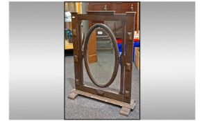 Early 20th Century Arts And Crafts Oak Free Standing Mirror, with oval swivel mirror. Height 36