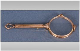 Ladies Pair Of Art Deco Gilt Metal Lorgnette's, spring loaded with engine turned handle.