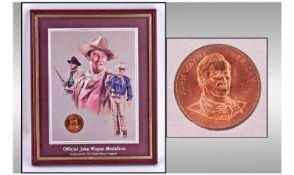 Official John Wayne Souvenir Medal And Picture. Mounted and framed behind glass. 11 x 9 inches.