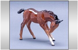 Beswick Large Foal Figure. Foal Head Down, Model No.947. Designer A. Gredington. 4.5 Inches High.