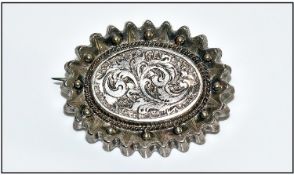 Early 20th Century Pressed Silver Brooch, Embossed Floral Decoration With Scalloped Edge. Unmarked