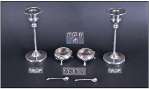 Two Victorian Silver Salts And Spoons In The Georgian Style, each raised on three hoof feet with