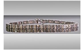 Ladies 9ct White Gold Set Baguette and Brilliant Cut Diamond Bracelet. The Diamonds of Good Colour