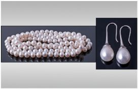 Fresh Water White Pearl Necklace, 44 inches long, plus pair of faux pearl drop earrings