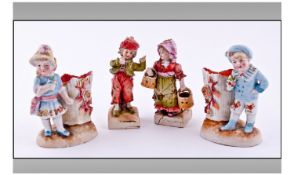 Pair of Conta and Boehme Figural Match Strikers each showing a child, a boy and a girl, in Victorian