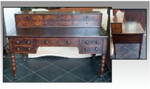 A French Flame Mahogany Regency Period Writing Desk/Table. With original tooled leathers to the