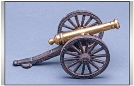 A Vintage - Realistic 19th Century Cast Iron and Brass Model Cannon and Carriage. 6.75 Inches In