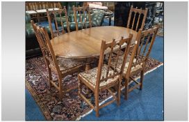 Oval Extending Dinning Table, on Turned support, carved stretcher, complete with 6 Jacobean style