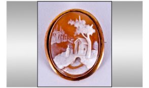 9ct GOld Framed Shell Cameo, Depicting an Outdoor Village Setting With Homes And Figure. 46 x