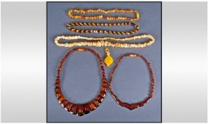 Collection Of Five Modern Amber Bead Necklaces Together With A Pendant